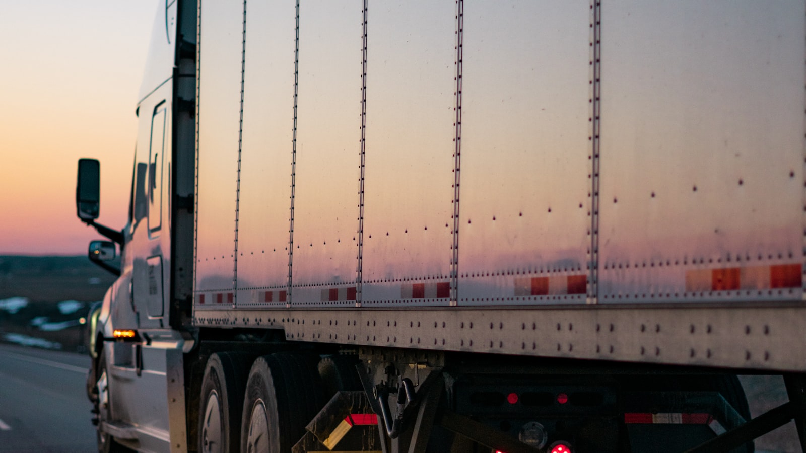 Fleet of delivery trucks at a distribution depot